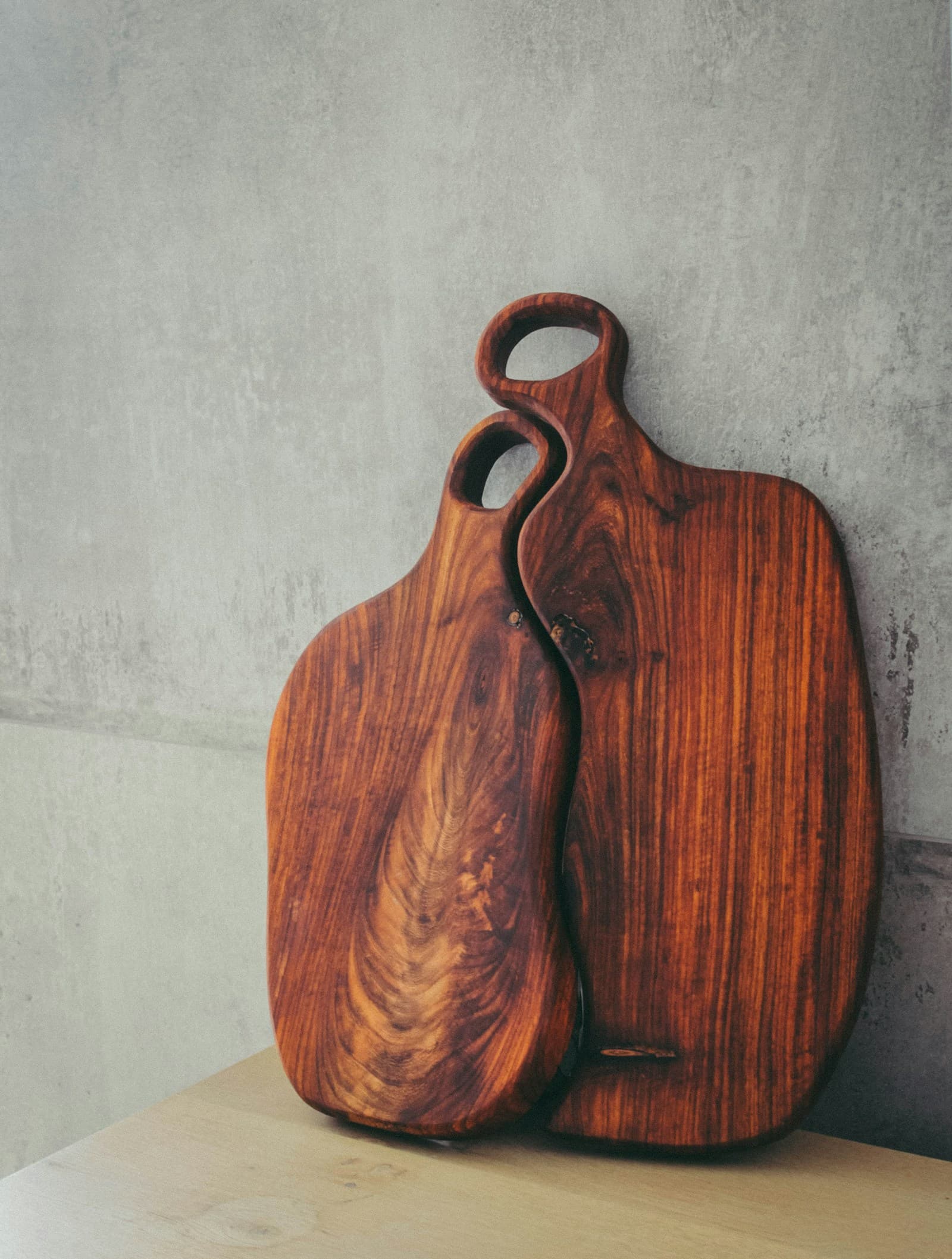Round wood serving board photographed from above
