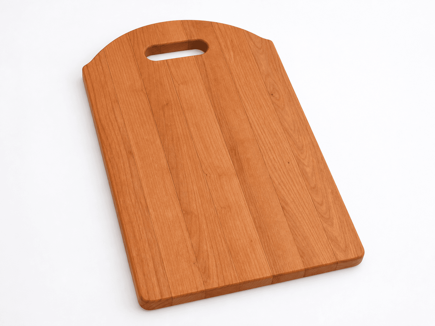 American cherry serving board with a shallow arched top and capsule handle