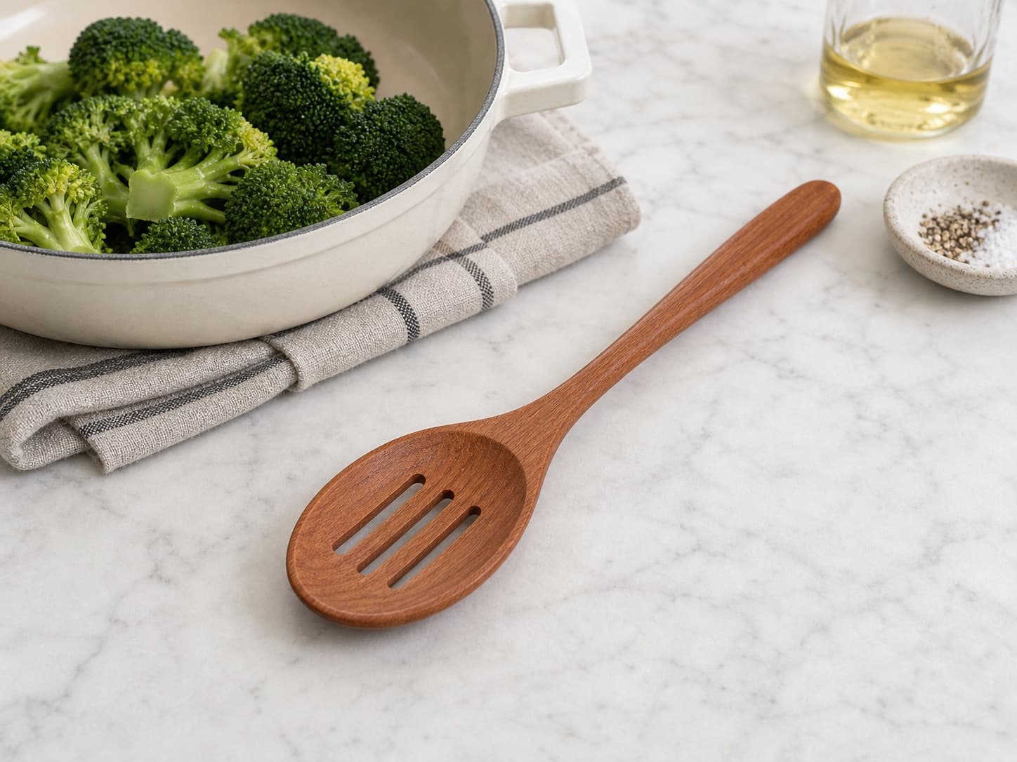 Slotted Cooking Spoon being used in a realistic kitchen setting