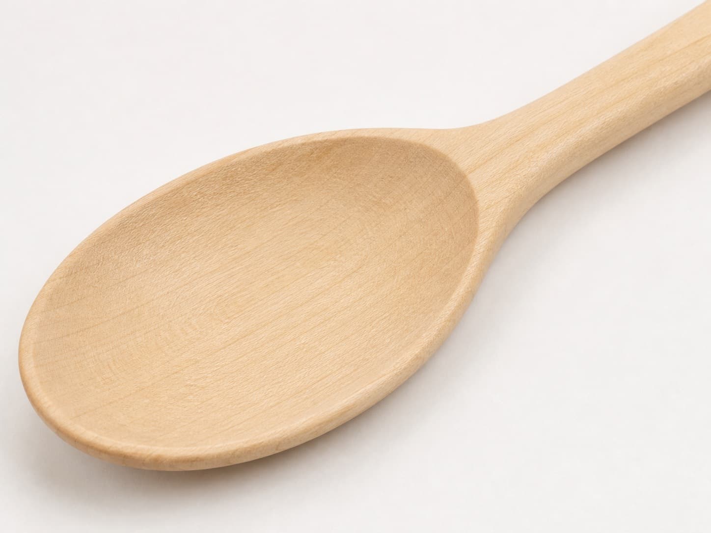 Close grain and material detail of Broad Serving Spoon