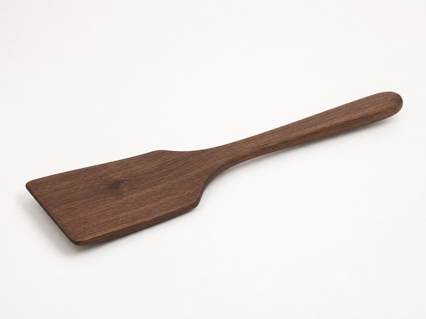 Low side angle showing the thickness and edge profile of Flat Spatula Turner