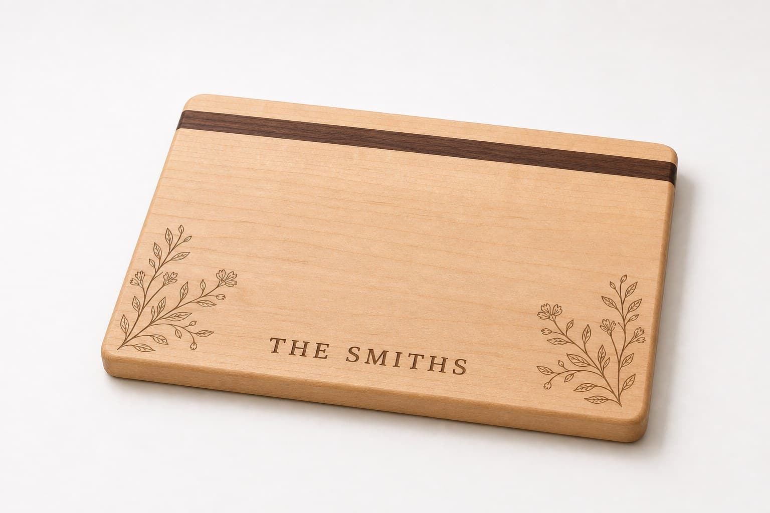 Hard maple gift board with walnut accent strip and CNC floral engraving