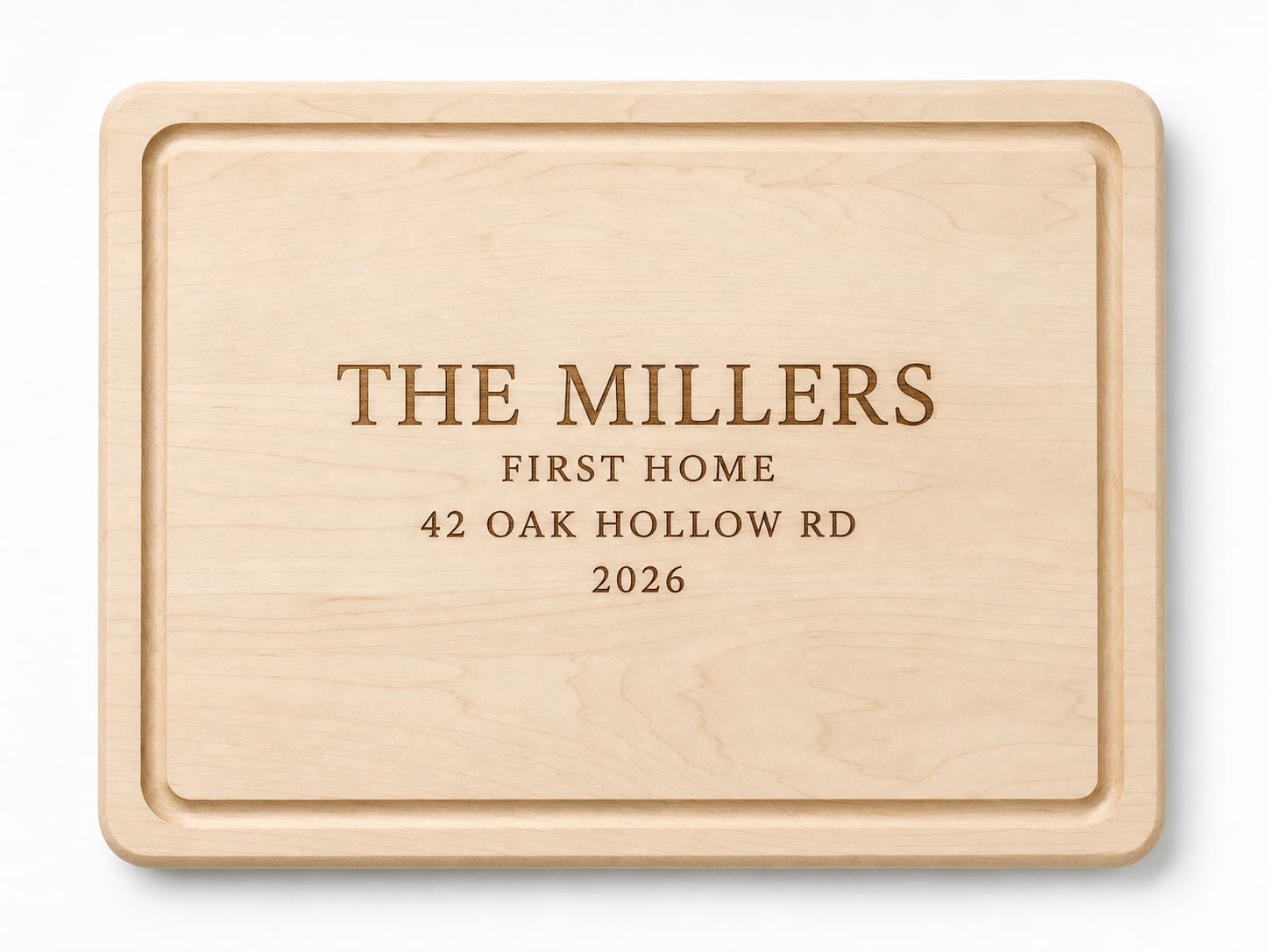 Custom New Home Maple Cutting Board photographed on a warm white product surface