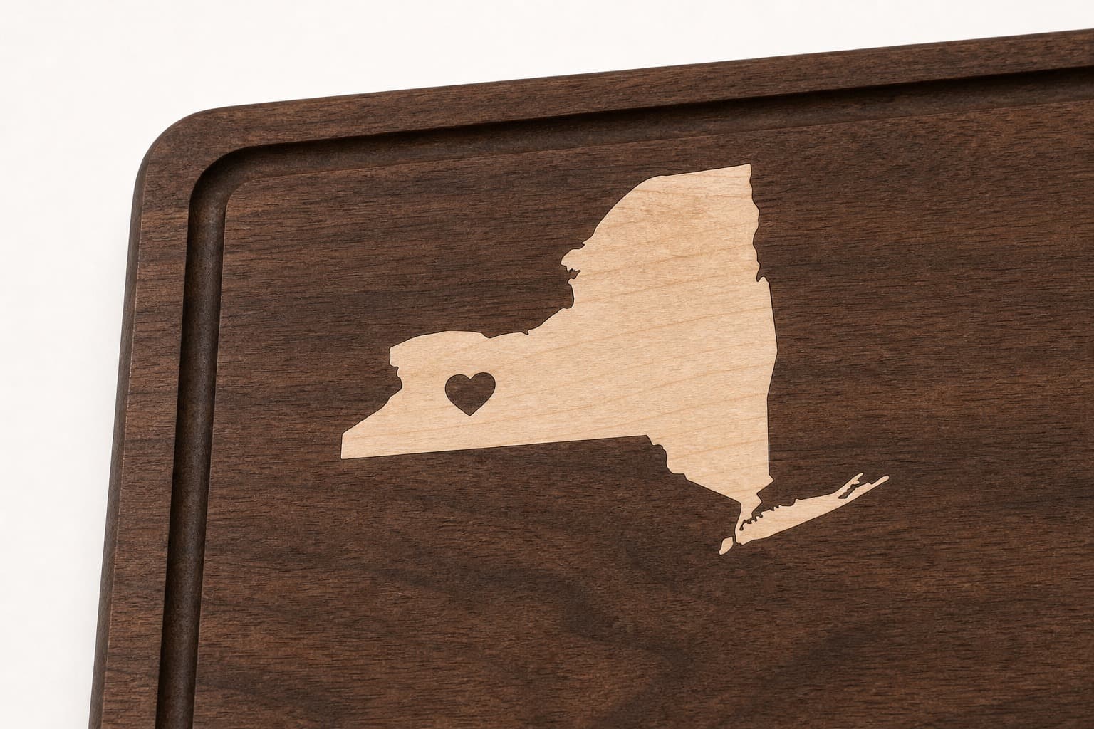 Close grain and material detail of Custom Home State Walnut Inlay Board