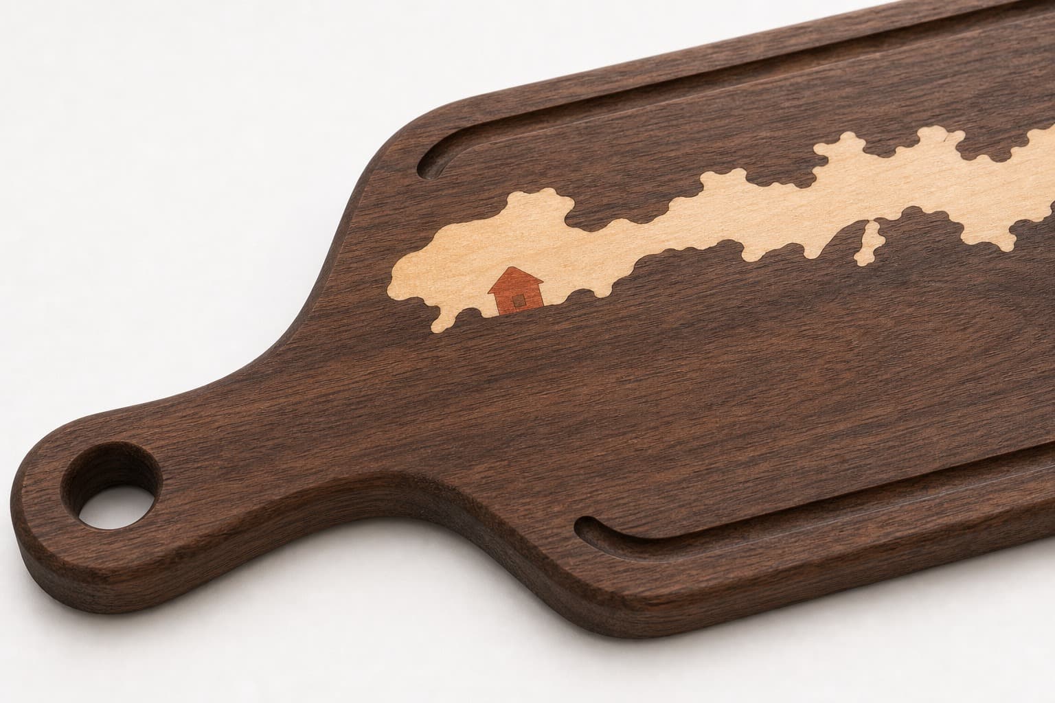 Close grain and material detail of Custom Lake House Map Walnut Paddle Board