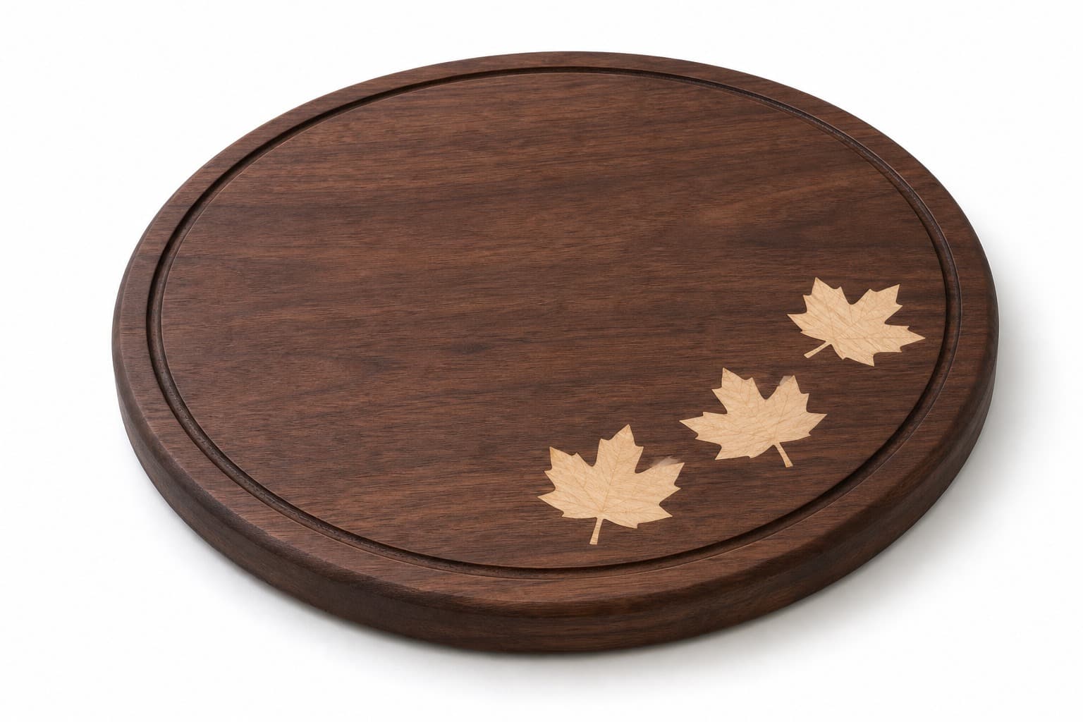 Maple Leaf Inlay Round Board photographed on a warm white product surface