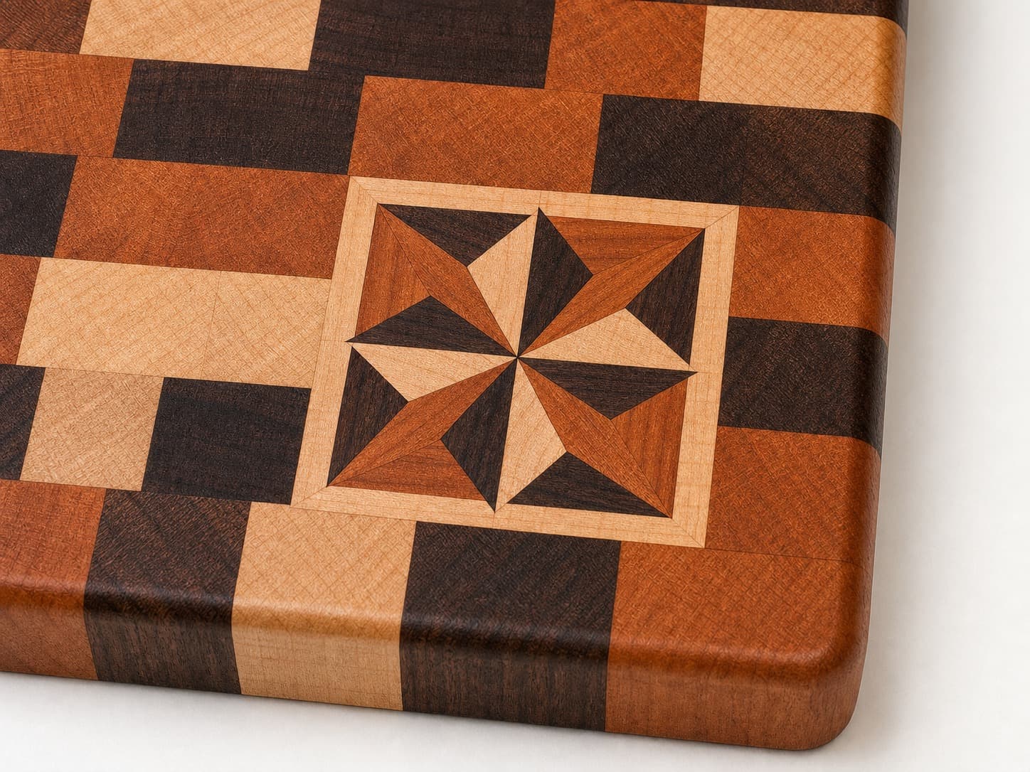 Close grain and material detail of Geometric Star Inlay End Grain Chef Block