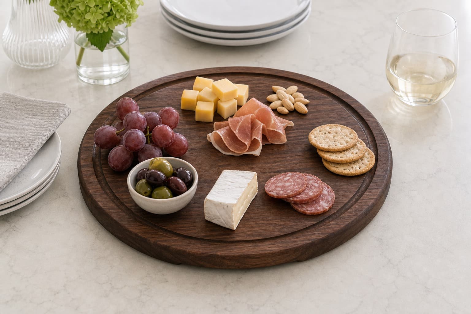 Round Walnut Serving Board being used in a realistic kitchen setting